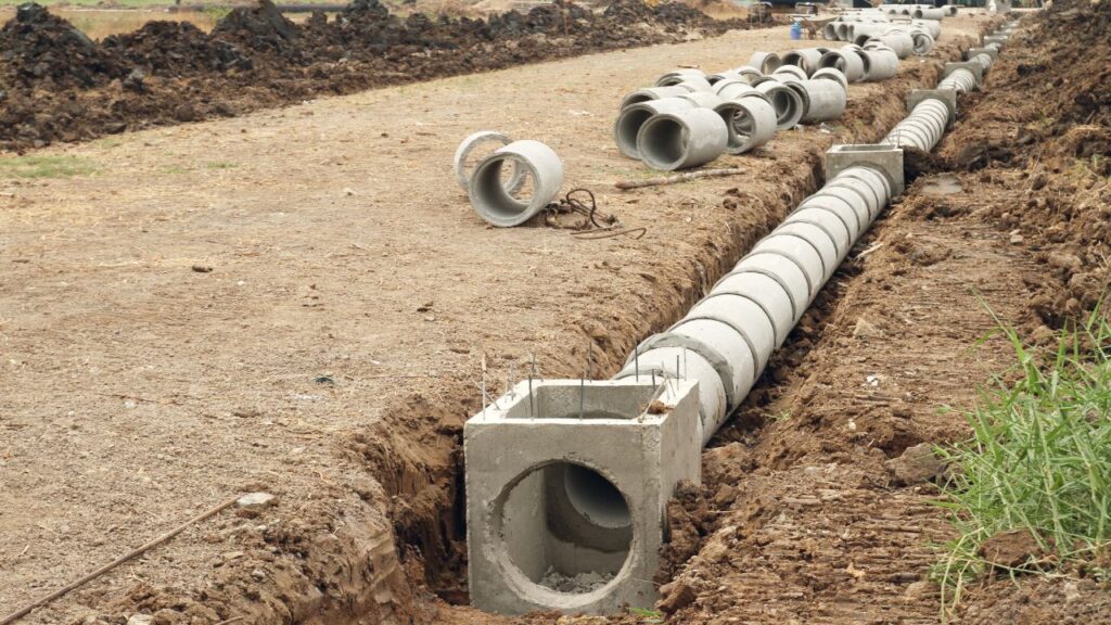 University Building Drainage System Cost Estimator